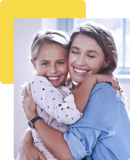 Mother and daughter smiling