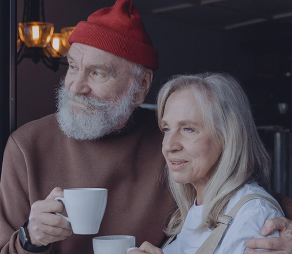 Older couple with mugs