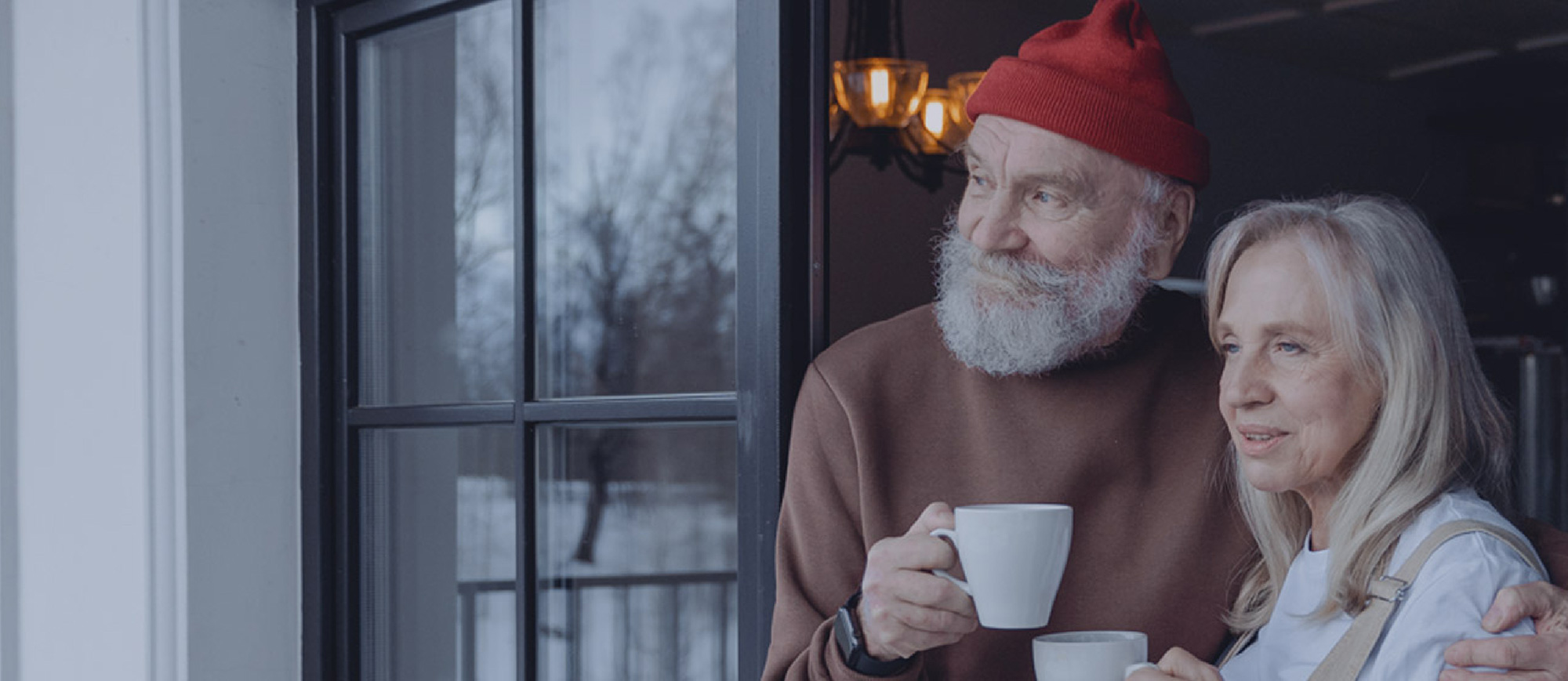 Older couple with mugs