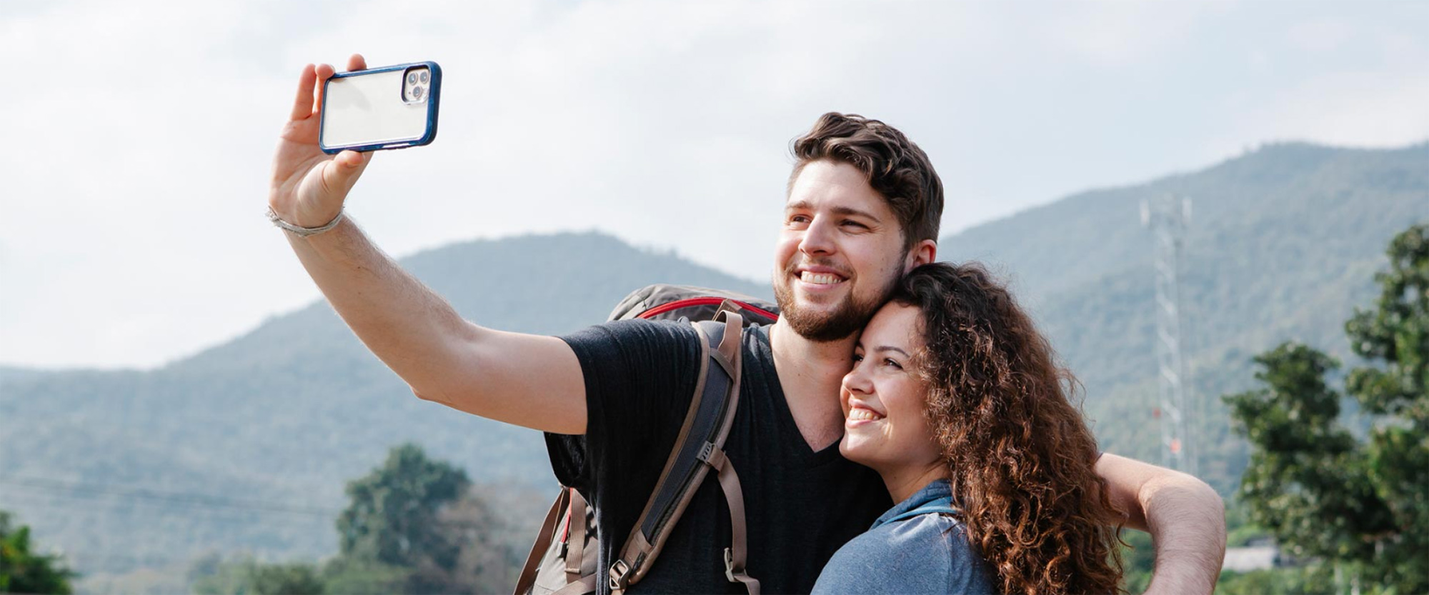 Smiling couple taking a selfie