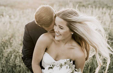 Smiling bride and groom