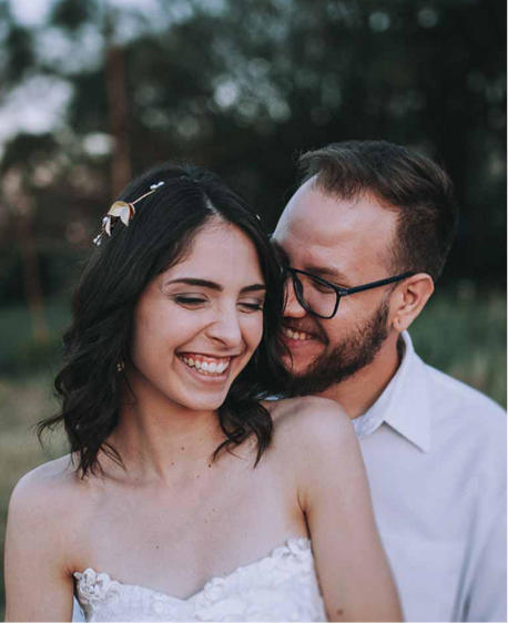 Smiling bride and groom