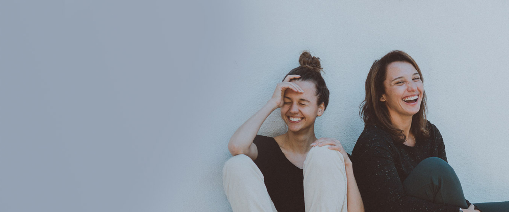 Two women laughing